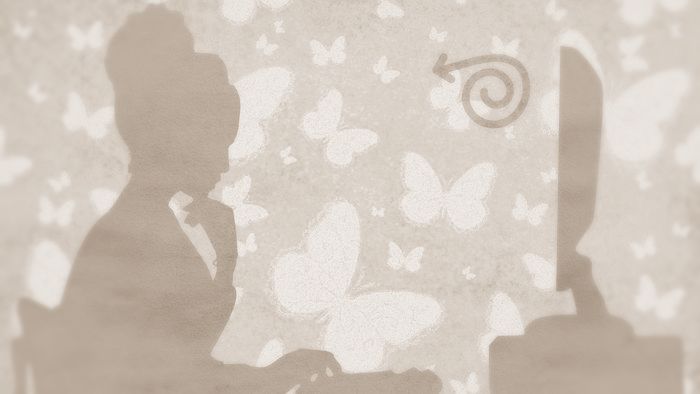 Silouhette d'une femme sur un fond jaune regardant un écran en se concentrant, la main sous le menton'